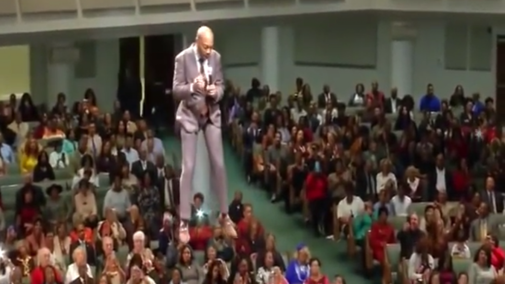 Pastor Orr dangles above his congregation in Mississippi