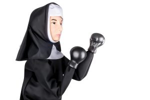 Photo of punching nun glove puppet