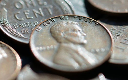 US coins showing the motto In God We Trust